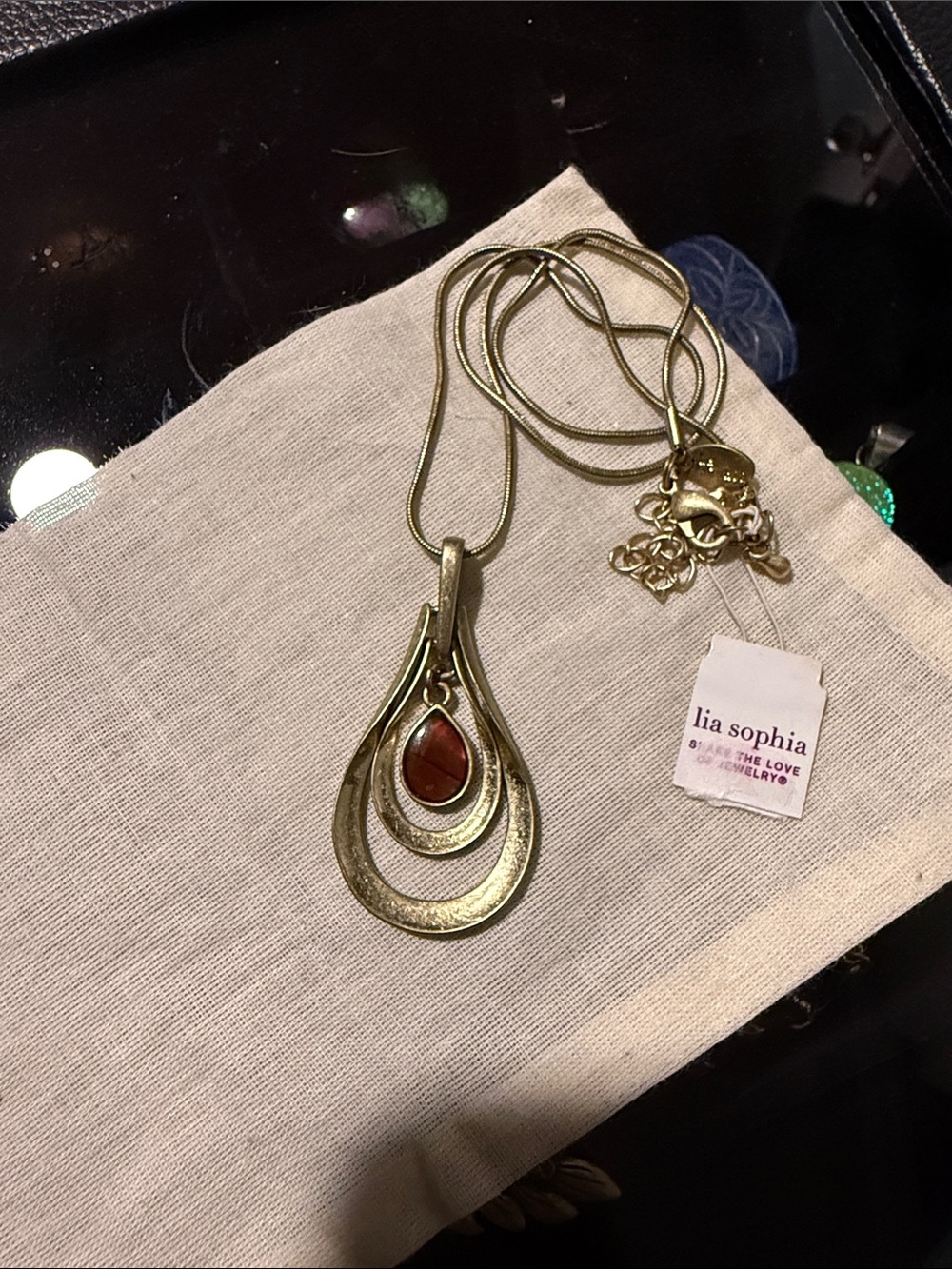 Lia Sophia Gold-Tone Layered Teardrop Necklace with Red Cabochon
